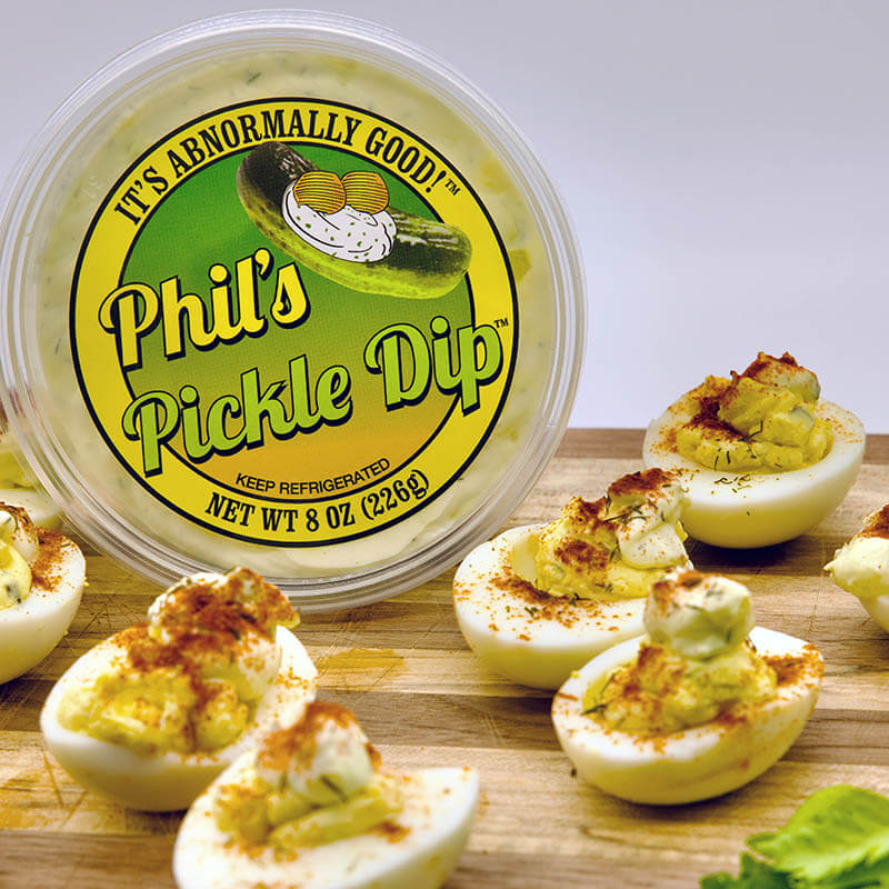 Phil's Pickle Dip container with deviled eggs