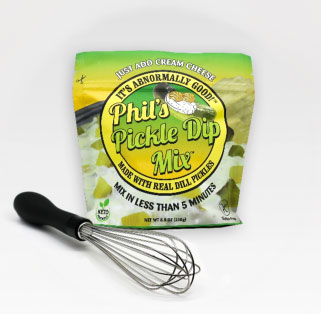 a packet of Phil's Pickle Dip Mix and a wire whisk